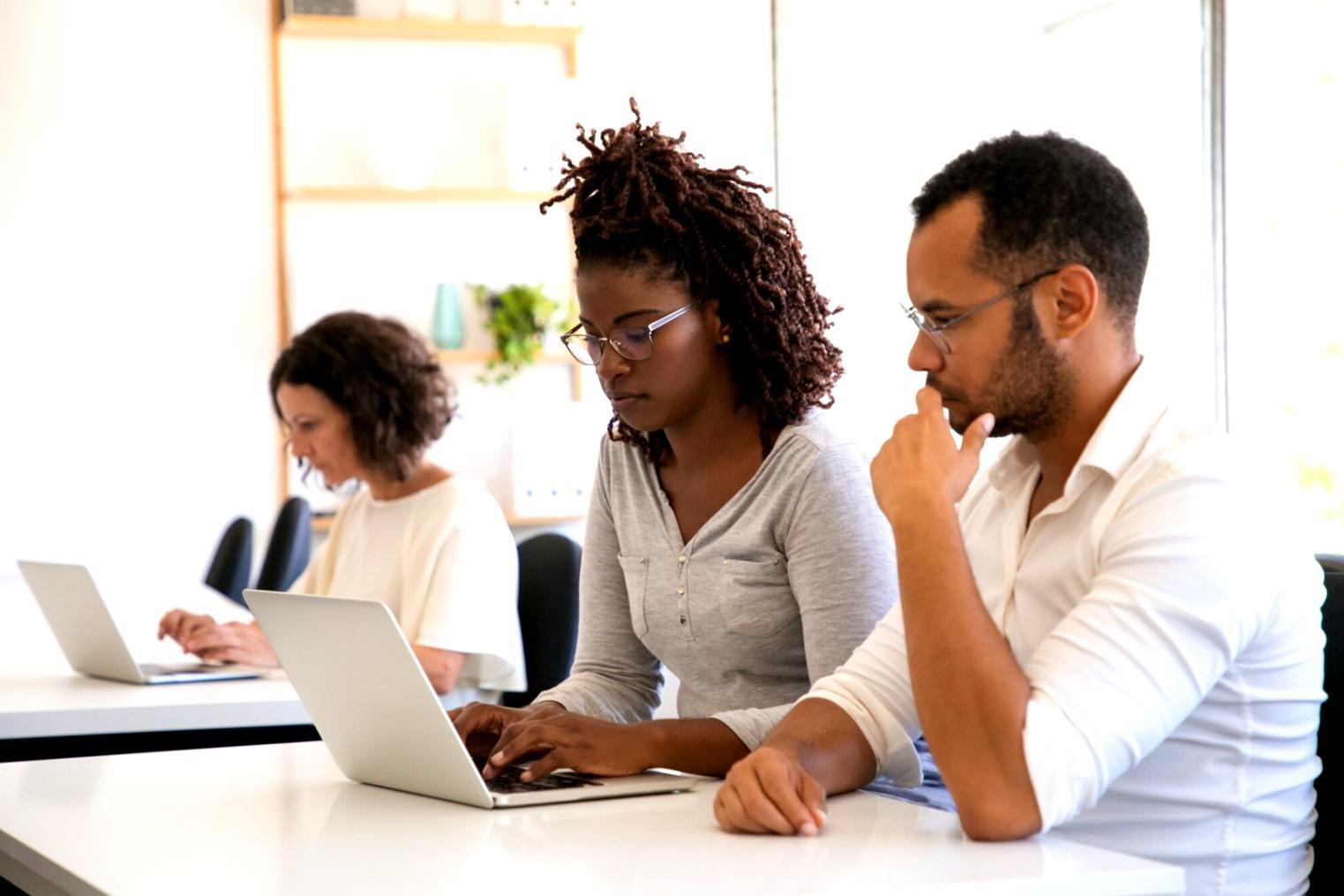 Team collaboration in modern workspace representing quariontivex's commitment to transparent financial education
